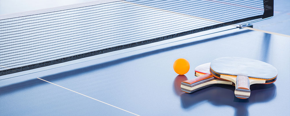 Close up padel or tennis racket and ball